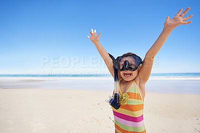 Buy stock photo Girl, happy and goggles for celebration at beach, energy and equipment for snorkeling on holiday. Female person, child and victory on tropical vacation in outdoor, sand and blue sky for mockup space