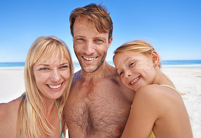 Buy stock photo Portrait, family at the beach and parents with kid outdoor, holiday in Sydney for summer and happy together. Man, woman and young girl with hug, adventure and travel, trust and support with bonding