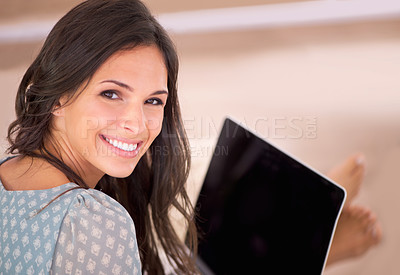 Buy stock photo Woman, blank laptop and smile on sofa with remote work from home, living room or freelance editing. Person, writer and computer in portrait for typing, mock up space and article on web in Barcelona