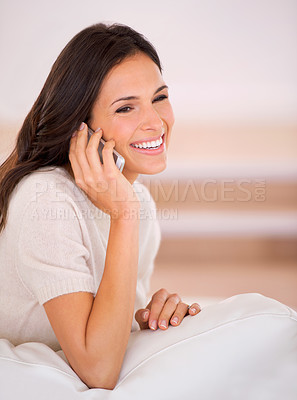 Buy stock photo Woman, happy and home with phone call on couch with thinking, talking and relax in living room. Girl, person and smile with smartphone, mobile network and chat on lounge sofa at apartment in Istanbul