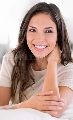 Buy stock photo Woman, happy and portrait on sofa to relax in home with pride, holiday and confidence in living room. Person, smile and morning on vacation, break and lounge with couch at apartment in Barcelona