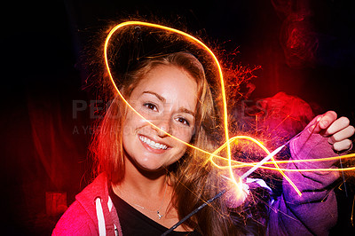 Buy stock photo Portrait, fireworks and playing with teenage girl, energy and celebration with weekend break and vacation. Face, person or pattern with guy fawks and event for New Year with fun or holiday with light