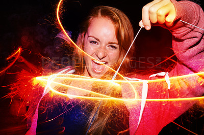 Buy stock photo Portrait, fireworks and sparklers with teenage girl, party and celebration with vacation and excited. Face, person or pattern with guy fawks or event for New Year with culture and holiday with energy