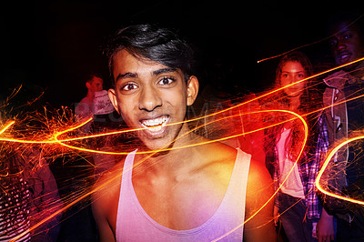 Buy stock photo Portrait, fireworks and celebration with teenage boy, party and vacation with fun and excited. Face, Indian person and pattern with guy fawks or event for New Year with culture and holiday with break