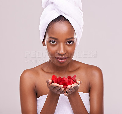 Buy stock photo Portrait, skincare and black woman with red petals, cosmetics and dermatology on a white studio background. Face, African person and model with natural beauty and grooming with treatment and luxury