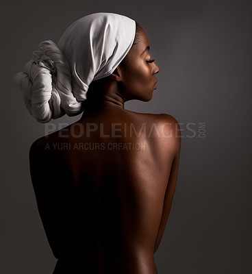 Buy stock photo Beauty, body and heritage with natural black woman in studio on gray background for wellness. Skincare, culture or tradition and aesthetic young model in Africa for cosmetics or dermatology from back