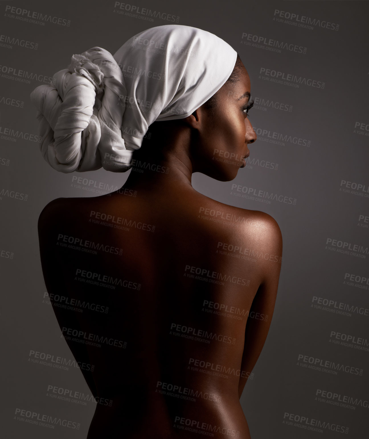 Buy stock photo Beauty, body and culture with natural black woman in studio on gray background for wellness. Skincare, heritage or tradition and aesthetic young model in Africa for cosmetics or dermatology from back