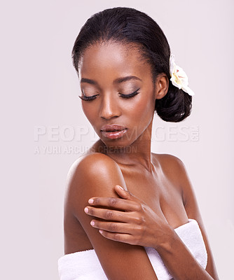 Buy stock photo Woman, face and body for cosmetics in studio with beauty, natural glow and self care with confidence. Model, african person or flower for cosmetology, facial treatment and towel on white background