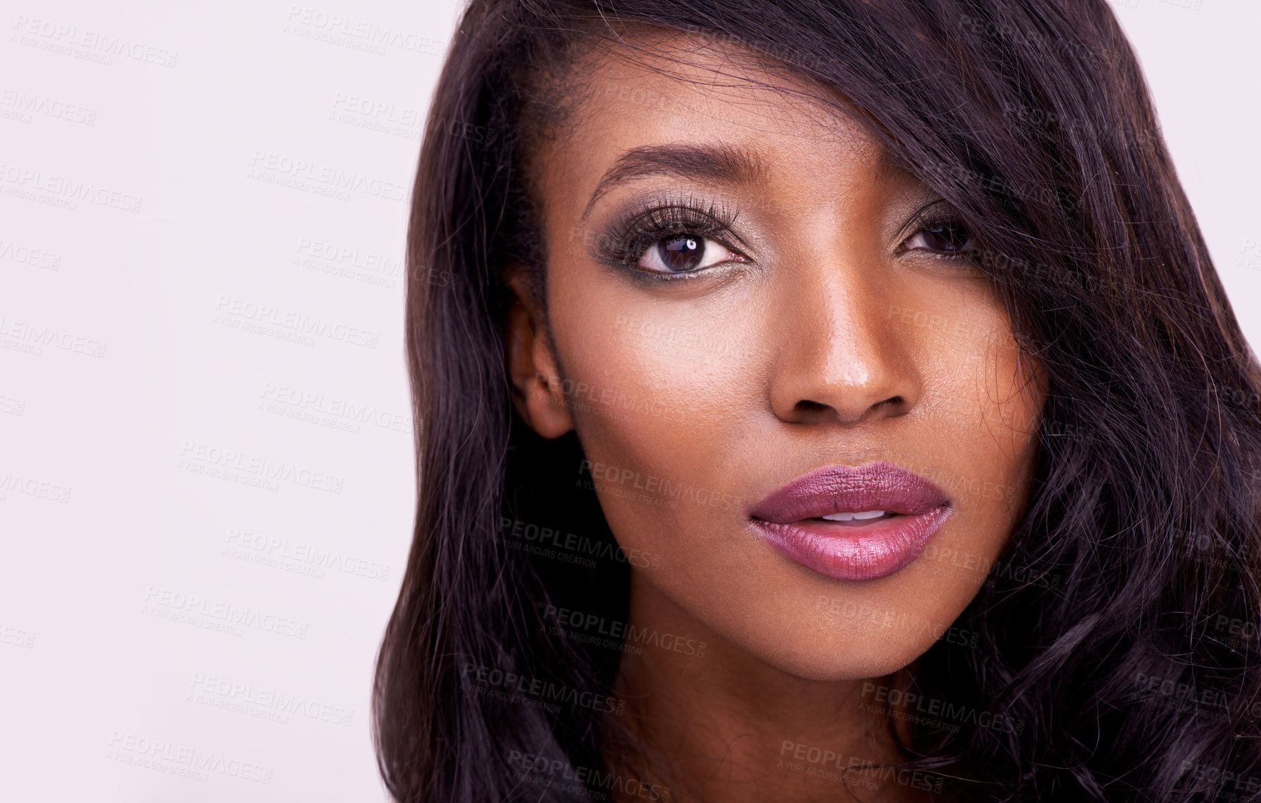 Buy stock photo Makeup, beauty and face of a black woman in studio for skin glow, hair extension or cosmetics. Portrait of african female model on a pink background for skincare, mockup space and luxury aesthetic