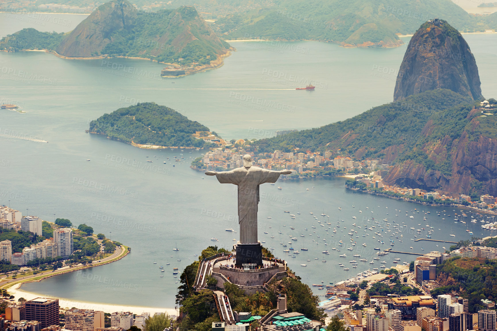 Buy stock photo Brazil landscape, city and Christ the Redeemer on hill for tourism, sightseeing and travel destination. Traveling, Rio de Janeiro and aerial view of statue, sculpture and global landmark on mountain