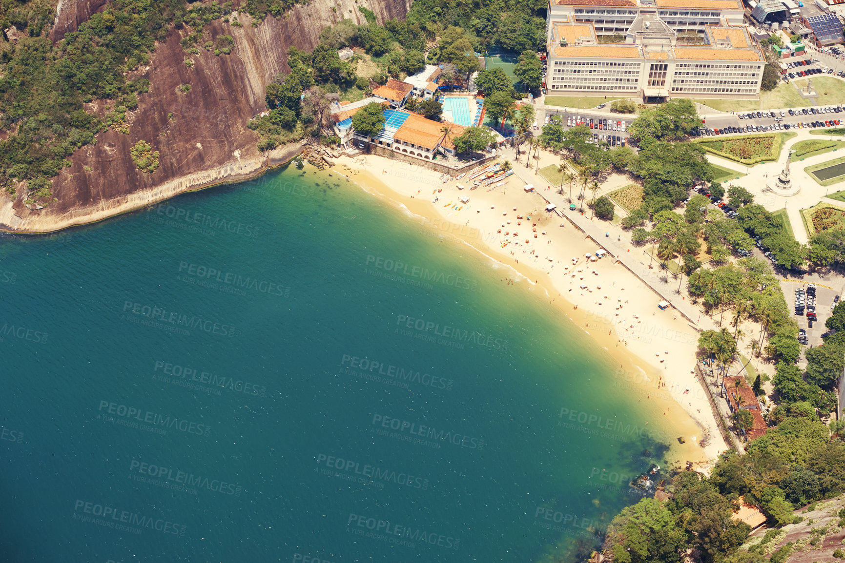 Buy stock photo Cropped shot of a city on the coastline with mountains surrounding it