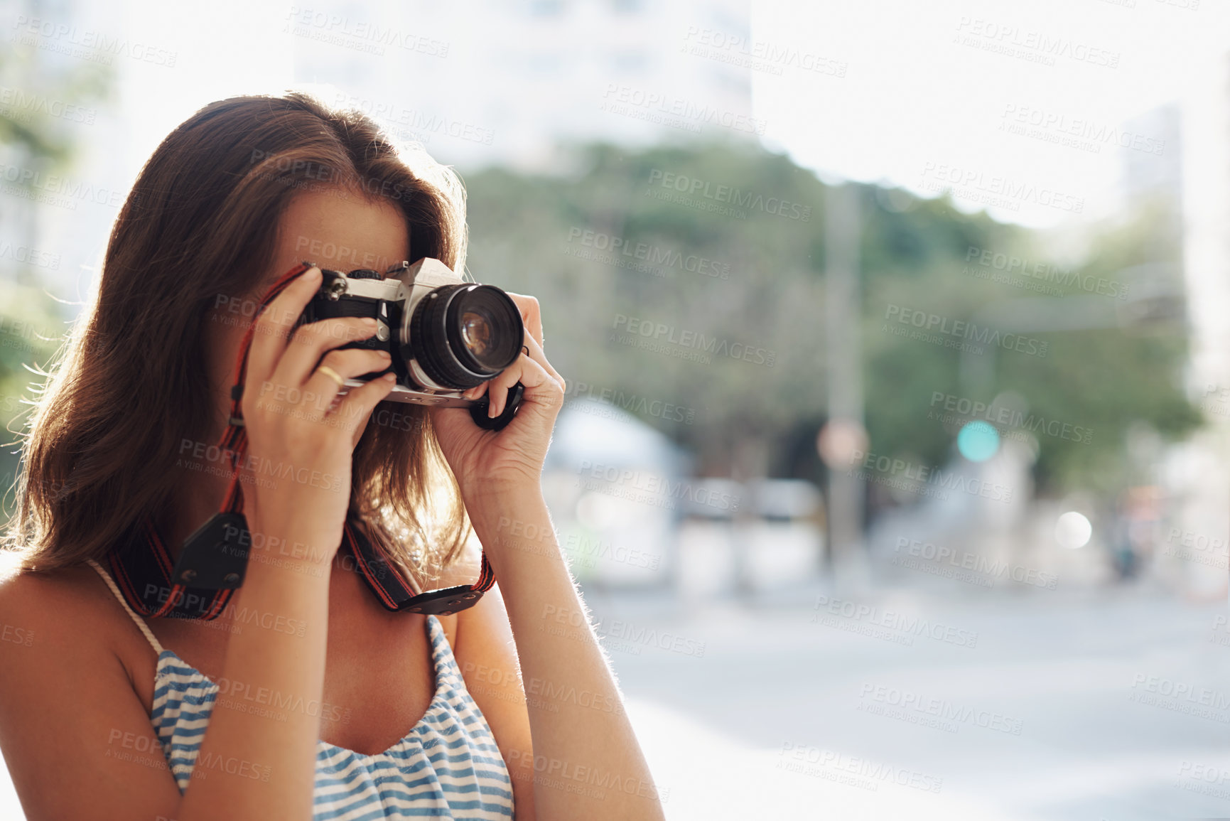 Buy stock photo Woman, photography and city street with camera for photo, memory or capturing outdoor moment. Female person, tourist or photographer taking picture with lens for sightseeing or travel in urban town