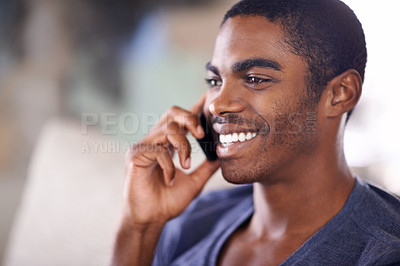 Buy stock photo African man, phone call and home on sofa with smile for conversation, contact and listening in lounge. Person, smartphone and happy for mobile connection, talking and chat on couch in house.