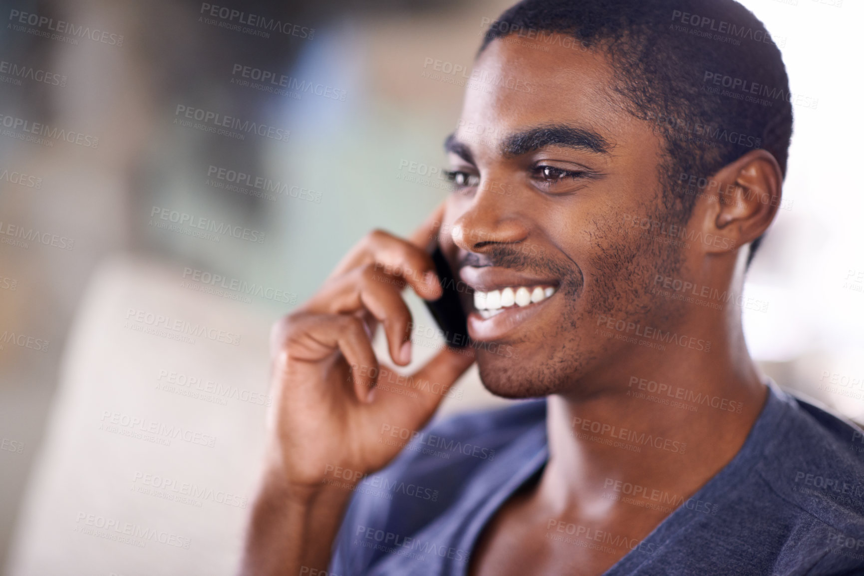 Buy stock photo African man, phone call and home on sofa with smile for conversation, contact and listening in lounge. Person, smartphone and happy for mobile connection, talking and chat on couch in house.