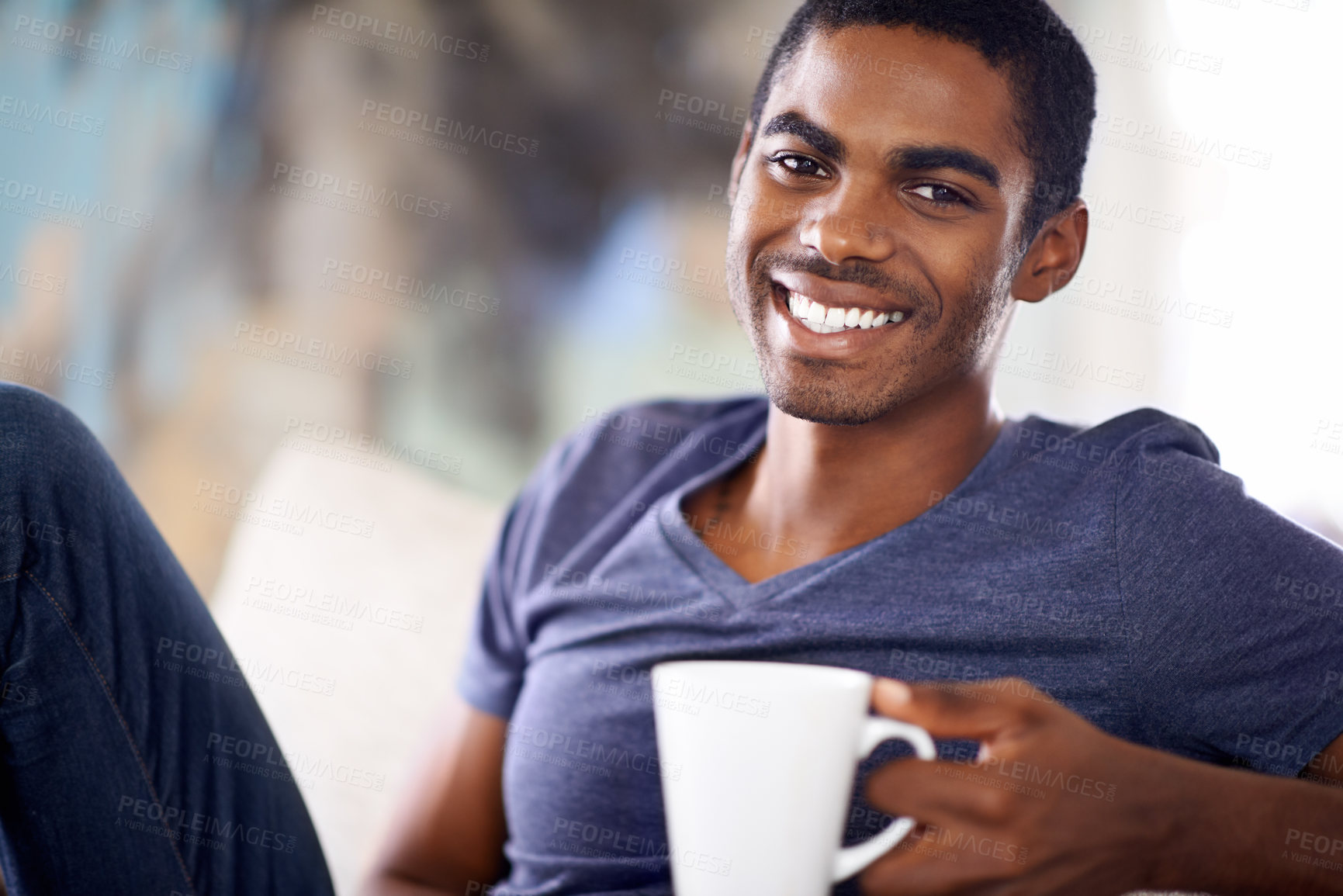 Buy stock photo Black man, portrait and smile with coffee in home to start morning on vacation to relax in living room. African person, happy and drink on sofa with tea cup, latte and chilling in lounge at apartment