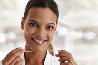 Buy stock photo Woman, dental and smile with floss, self care and portrait for health in bathroom. Person, cleaning and healthcare for teeth, oral hygiene and routine at home or house with dentistry and whitening
