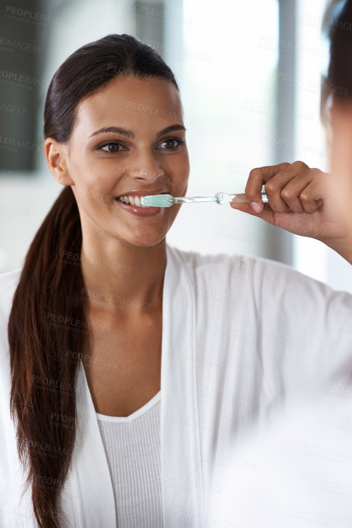 Buy stock photo Woman, brushing teeth and toothbrush for dental, mirror with smile in bathroom for morning routine. Oral hygiene, wellness and orthodontics with toothpaste for fresh breath, health and self care