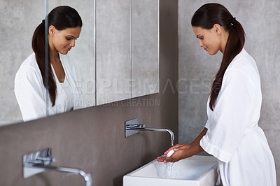 Buy stock photo Woman, soap and washing hands in bathroom for hygiene, skincare and germ protection or wellness at home or hotel. Young person with water from tap, product and cleaning of bacteria or health at basin