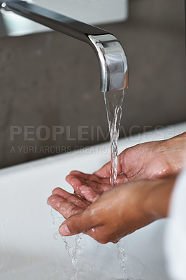 Buy stock photo Handwashing, water and person in bathroom for hygiene, wellness and safety from germs or bacteria in home. Cleaning hands, liquid and self care with skincare, disinfection and splash in sink