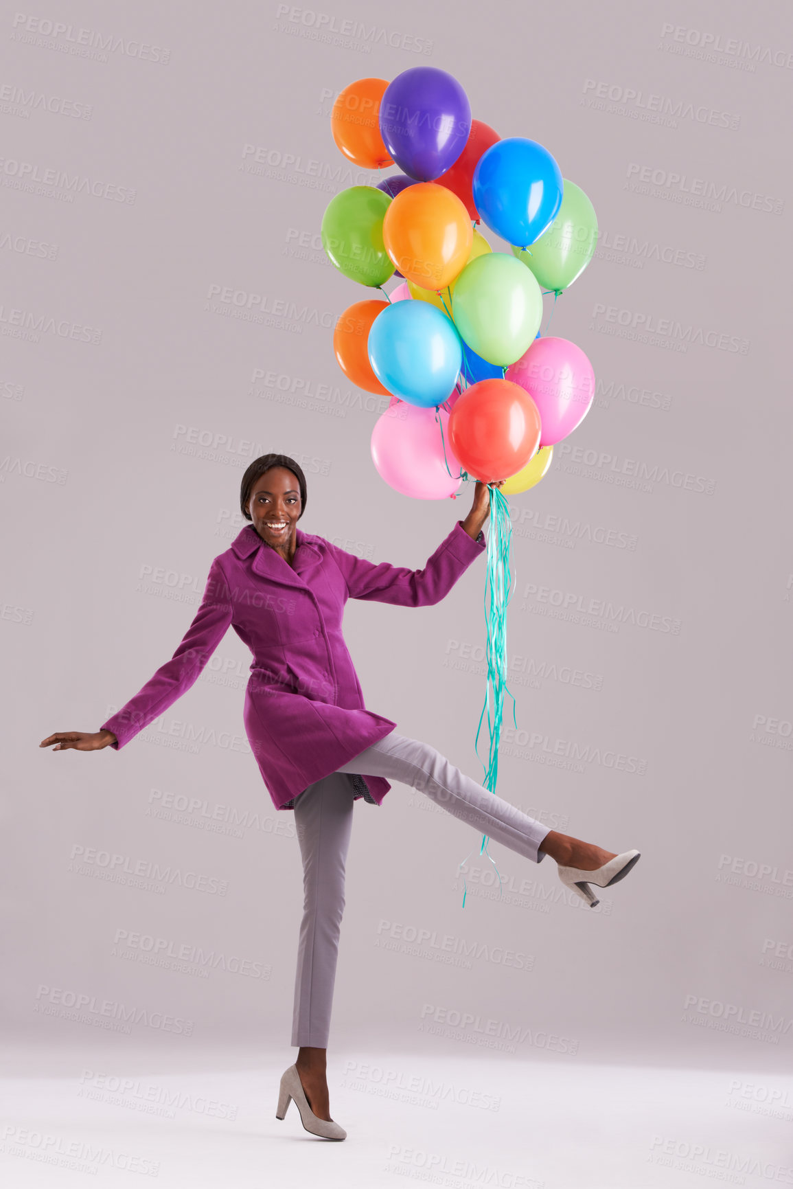 Buy stock photo Balloon, excited and portrait of black woman in studio for birthday, celebration and present. Happy, fashion and isolated person smile with inflatables for party, gift and surprise on gray background
