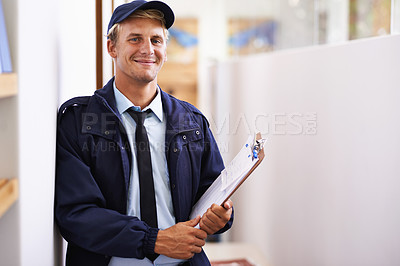 Buy stock photo Portrait, smile and delivery with courier man at office for distribution, shipping or service. Ecommerce, logistics or retail and happy young postal worker with clipboard for manifest or order