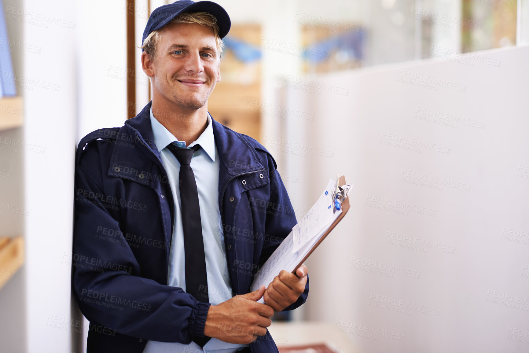 Buy stock photo Portrait, smile and delivery with courier man at office for distribution, shipping or service. Ecommerce, logistics or retail and happy young postal worker with clipboard for manifest or order