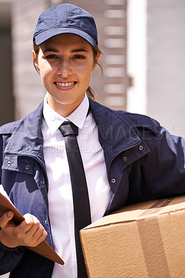 Buy stock photo Delivery woman, box and outdoor in portrait by houses for distribution, smile or shipping job in neighborhood. Girl, courier and employee in supply chain, logistics or clipboard for cardboard package