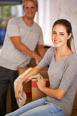 Buy stock photo Couple, moving and portrait of packing a box and excited for new house and preparing for property. People, unboxing and happy to rent real estate, apartment and start of marriage in home together