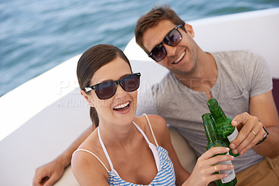 Buy stock photo Couple, portrait and toast on yacht, boat and cruise for honeymoon, holiday and vacation. Lovers, husband and wife together for alcohol with partnership, love and marriage by sea, ocean or beach
