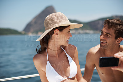 Buy stock photo Summer, yacht and couple with selfie at sea for vacation,  luxury holiday and outdoor adventure together. Travel, happy man and woman smile of photography for social media update, ocean and boat.