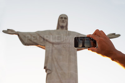 Buy stock photo Jesus christ, statue or hand of tourist with photo of sculpture for travel or christian faith for art. Person, history monument or peace for tourism, God or religion symbol in Rio de Janeiro, Brazil 