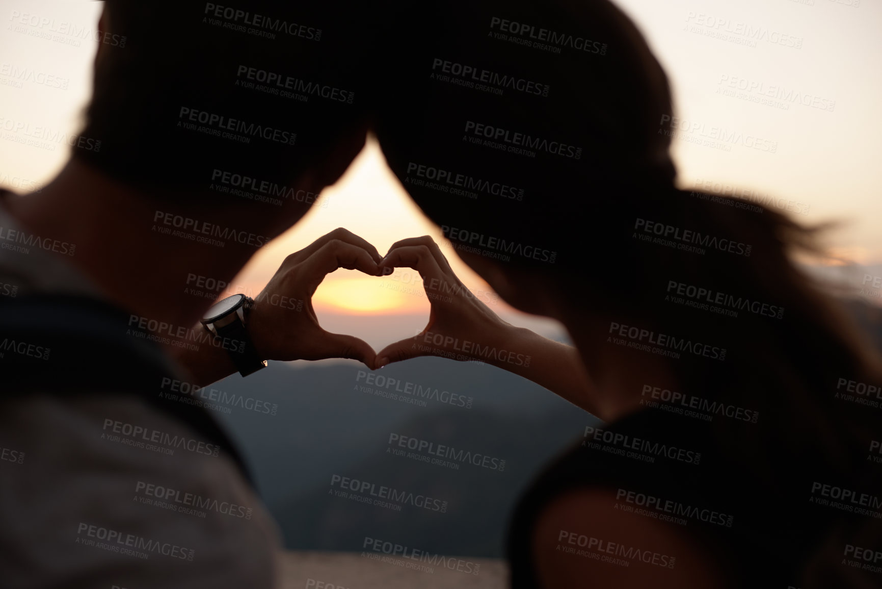 Buy stock photo Travel, heart hands and couple in mountains with view of sky together on holiday or vacation abroad. Love, hiking or backpacking with emoji of man and woman outdoor for tourism overseas from back