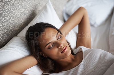 Buy stock photo A beautiful young woman sleeping in her bed