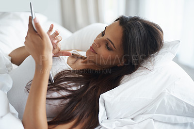 Buy stock photo Typing, tablet and woman in bedroom of home and mattress for bed, lazy and morning. Digital, rest and female person on day off to relax in apartment, blanket and cosy in house with technology