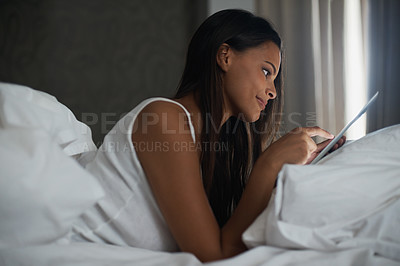 Buy stock photo Bedroom, night and woman online with tablet, social media and connection to internet for app. Bed, smile and communication with mobile, digital and female person on dating site with technology