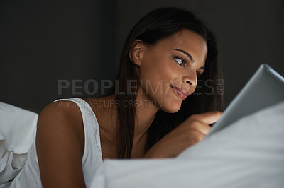 Buy stock photo Bedroom, night and woman online with tablet, social media and connection to internet for dating app. Bed, smile and communication with mobile, digital and female person on site with technology