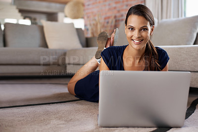 Buy stock photo Portrait, female student and laptop on floor, home and technology for social media scrolling. Computer, smile or relaxed woman in lounge, website and online for cyber communication and connection