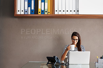 Buy stock photo Laptop, coffee and business woman in office for planning, management and checking email against wall background. Tea, relax and female manager online for project, proposal or creative idea research
