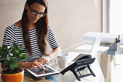 Buy stock photo Woman, tablet and desk with laptop for research, reading notification and checking email in office. Journalist, technology and thinking with electronics for idea, planning or online communication