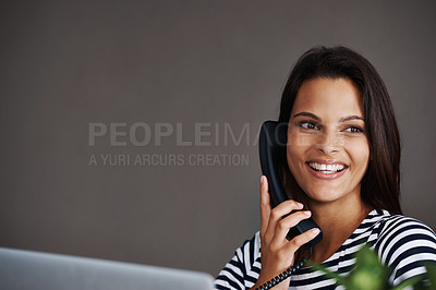 Buy stock photo Telephone call, smile and business woman in conversation, talking or listening to contact in startup office. Landline, happy and secretary on phone, receptionist and creative person with mockup space