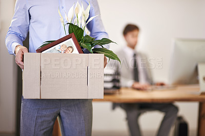 Buy stock photo Cropped shot of a businessman leaving work as he's being replaced by a new employee