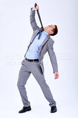 Buy stock photo Businessman, studio and strangling with a tie for crisis, stress and company failure by white background. Accountant, bankruptcy and problem in stock market, mistake and loss of investor confidence
