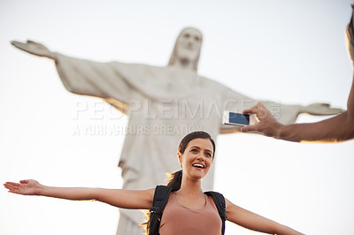 Buy stock photo Woman, photo and jesus statue for travel, backpacking and happy on journey on summer vacation. Art deco sculpture, peace or christ the redeemer in photography of lady or tourism destination in brazil