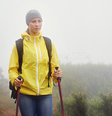 Buy stock photo Woman, trekking and fitness in nature with pole for backpacking, travel and outdoor adventure. Journey, path and female person in hiking gear for exercise, balance or health in forest trail.