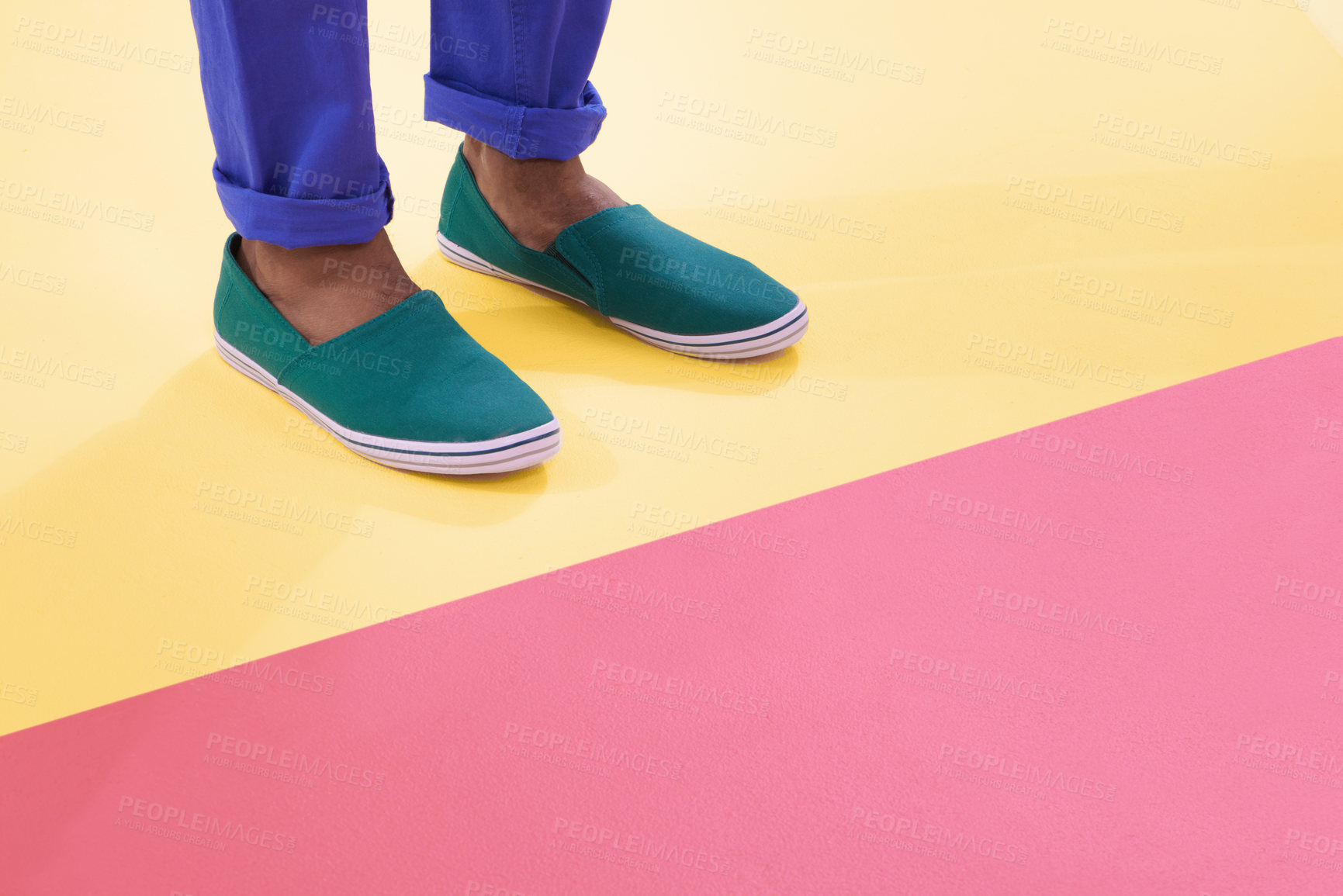 Buy stock photo Cropped shot of footwear on a colourful background