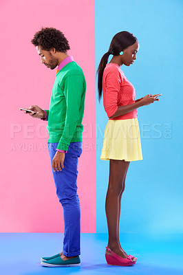 Buy stock photo Couple, texting and phone in colorful clothes for fashion, dating or new love with crush. African people, young and serious for message on cell for flirting, conversation and chatting together 