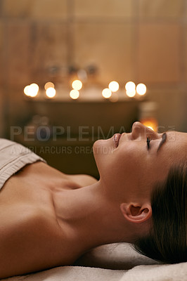 Buy stock photo Woman, spa and candle with luxury, calm and peace with wellness and bokeh. Person, skincare and health for zen, relax and body care at resort or massage parlour and serene rest and treatment