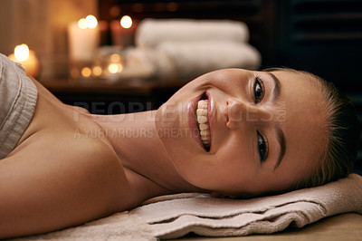 Buy stock photo Happy, woman and portrait in spa with candles at night for luxury treatment in hotel on vacation. Girl, relax and smile on table for cosmetics, skincare and holiday at resort for beauty and wellness