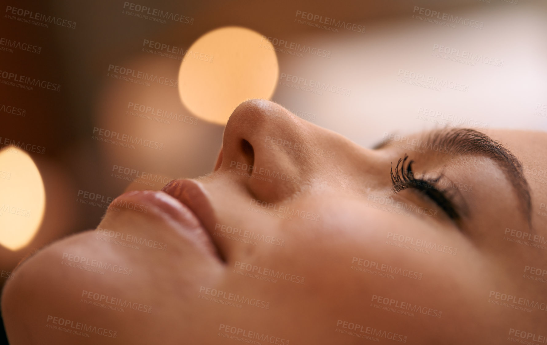 Buy stock photo Woman, spa and luxury with smile, relax and peace with wellness and bokeh. Person, skincare and health for zen, calm and beauty care at resort or massage parlour and serene ambience and treatment