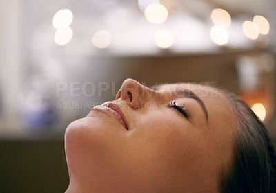 Buy stock photo Closeup of a young woman's face during a massage